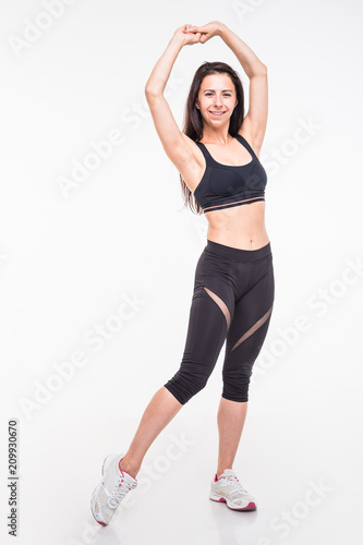 Athlete engaged in fitness on a white background