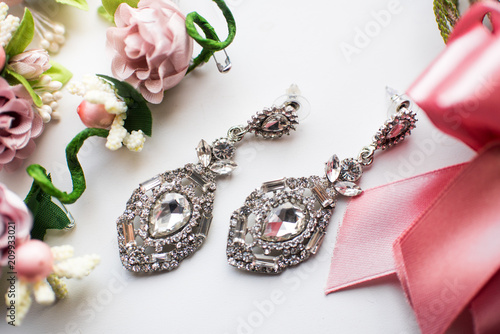 Beautiful vintage earrings on white background