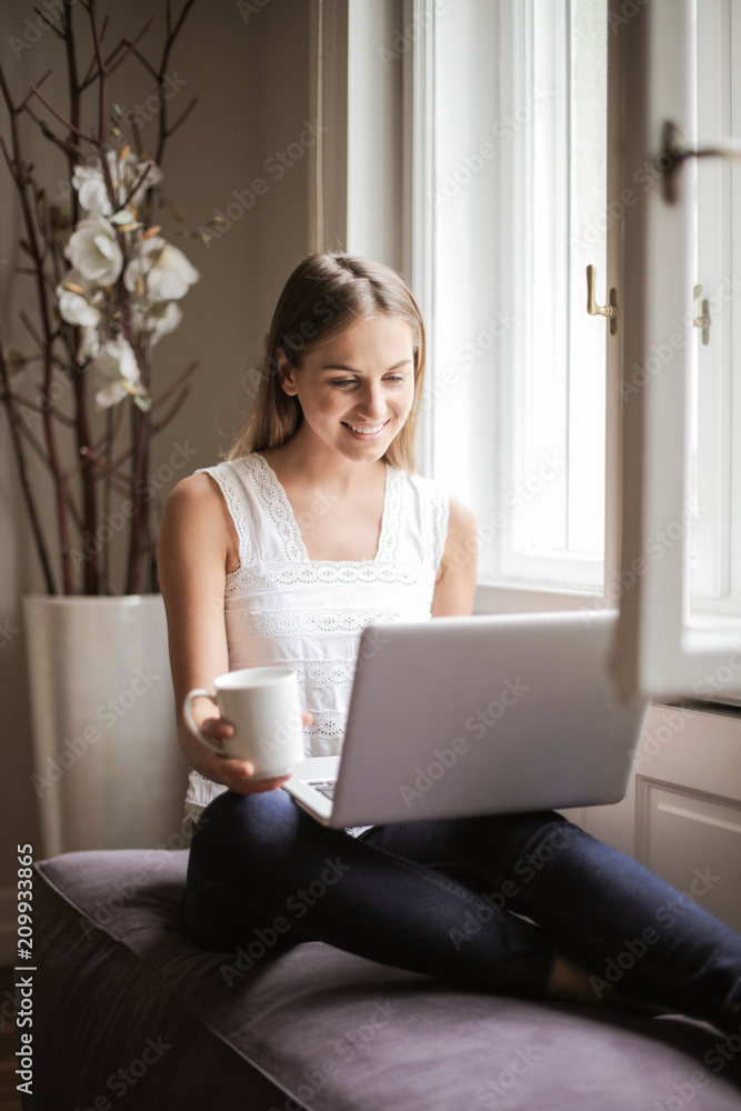 Young woman using a laptop Young woman using a laptop