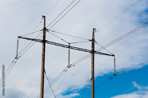 high voltage wooden electricity poles