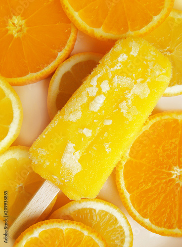 Homemade orange and lemon popsicle