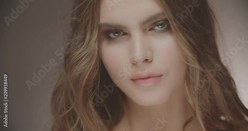 Wallpaper Mural Young beautiful girl with bright makeup looking at camera 4k Torontodigital.ca