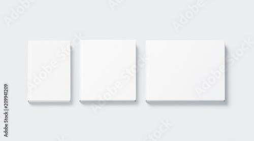 Blank white square and rectangular hardback books mock up, top view, 3d rendering. Empty notebooks hard cover mockups, isolated. Bookstore booklet branding template.