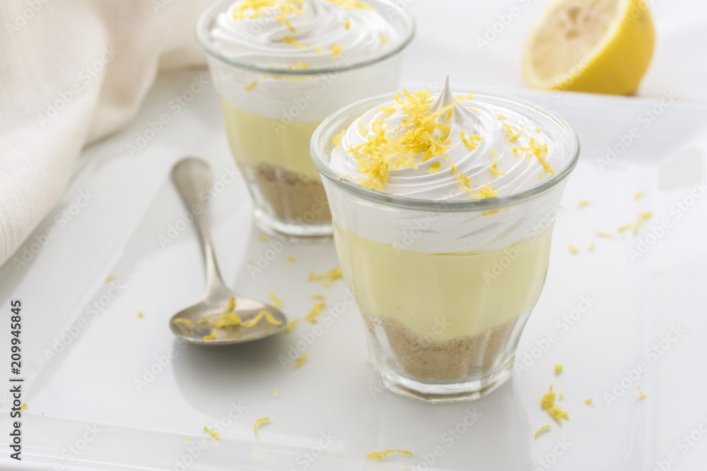 Layered dessert with lemon cream, ice cream and whipped cream Layered dessert with lemon cream, ice cream and whipped cream