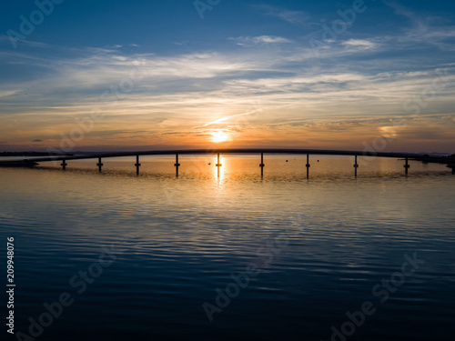 Sunset behind bridge on island Vir, bridge over Adriatic sea