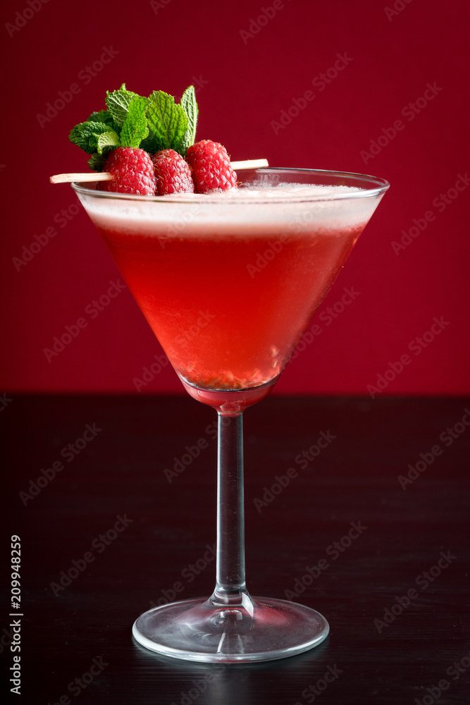 raspberry cosmopolitan martini vodka cocktail drink bar mint garnish ice bartender