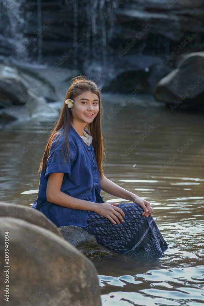 Beautiful women wearing traditional dress in the mountain waterfall
Beautiful women wearing traditional dress in the mountain waterfall