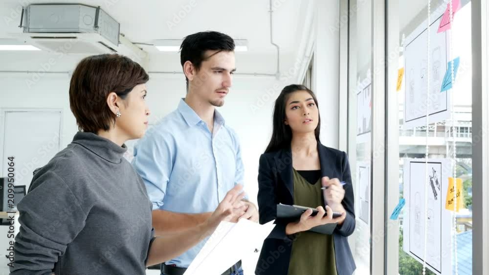 Business team talking to idea for business at office. Business team talking to idea for business at office.