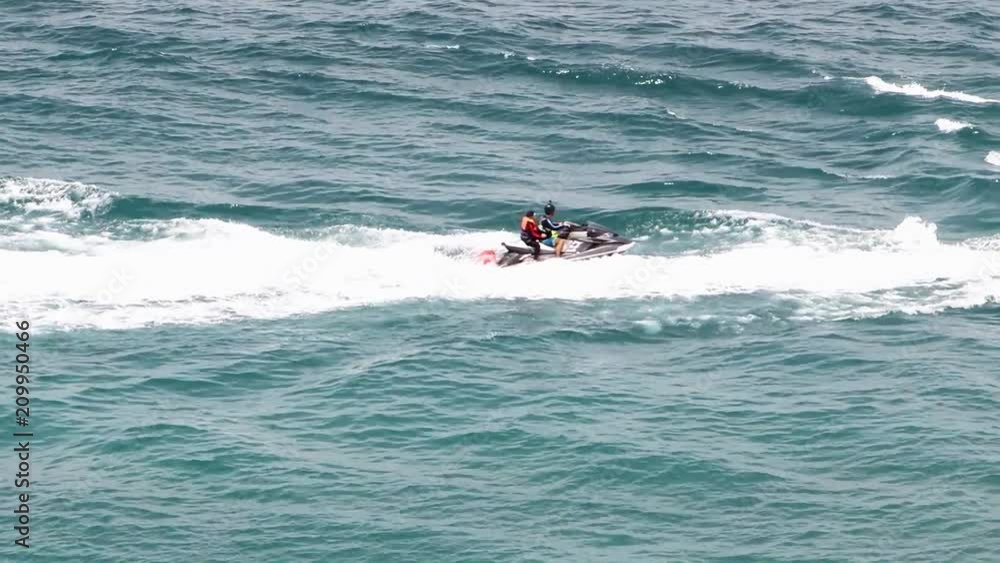 PATTAYA, THAILAND, APR 29 2018, The people riding on the water scooter at tropical sea, Thailand. PATTAYA, THAILAND, APR 29 2018, The people riding on the water scooter at tropical sea, Thailand.