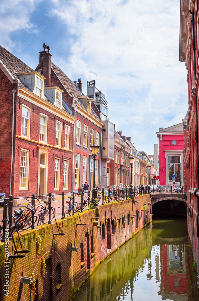 Naklejka premium Traditional old street and buildings in Utrecht, Netherlands.