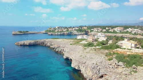 Aerial landscape of the beautiful bay of Cala Mandia with a wonderful turquoise sea, Porto Cristo, Majorca, Spain photo