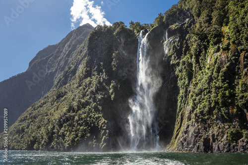 Waterfall at Milford Sound  Fiordland  New Zealand