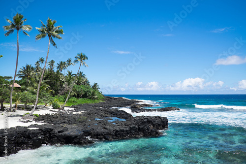 Idyllic tropical beach with blue sea and sky at Lefaga, Matautu, Upolu Island, Samoa, South Pacific