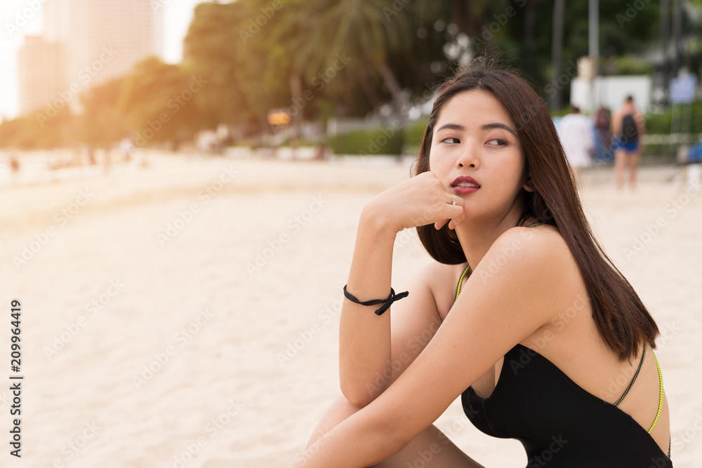 Asian beautiful woman enjoyful on the beach background. Asian beautiful woman enjoyful on the beach background.