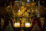 statue old buddha on shelf in temple at Ayutthaya Thailand