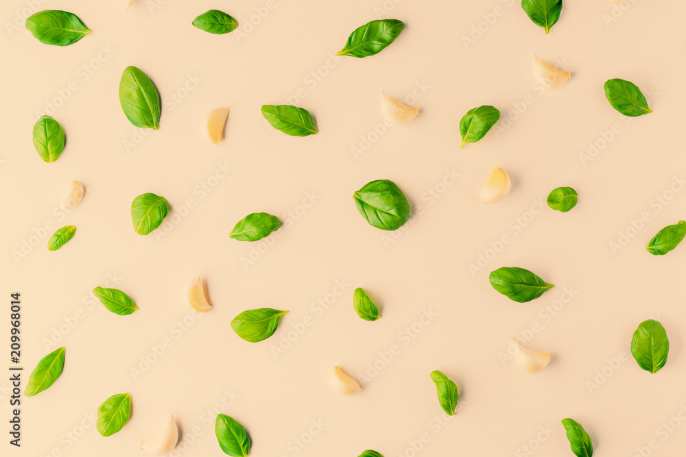 basil leaves and garlic on white background basil leaves and garlic on white background