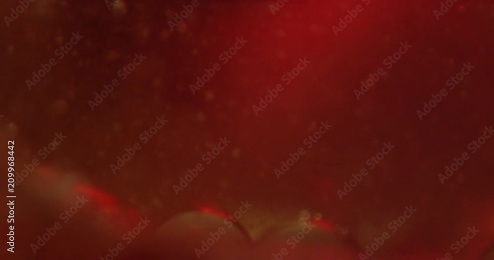 Color drops floating in oil and water over a colorful underground with oil painting effect. 4K. Color drops floating in oil and water over a colorful underground with oil painting effect. 4K.