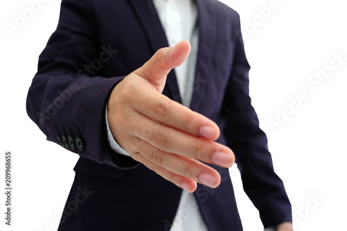 Business man extending hand to shake isolated on white background.