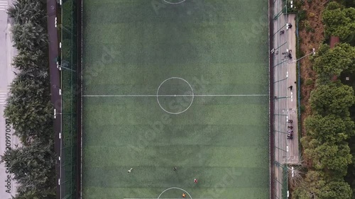 Aerial view of a Soccer Play on the grass football field