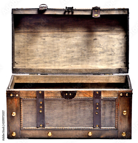 Open old wooden chest with ornamental forging and leather straps isolated on white background