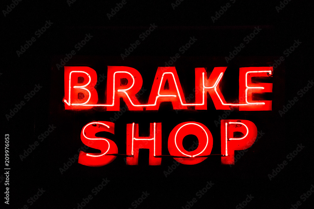 Obraz premium Red Neon Brake Shop Sign
