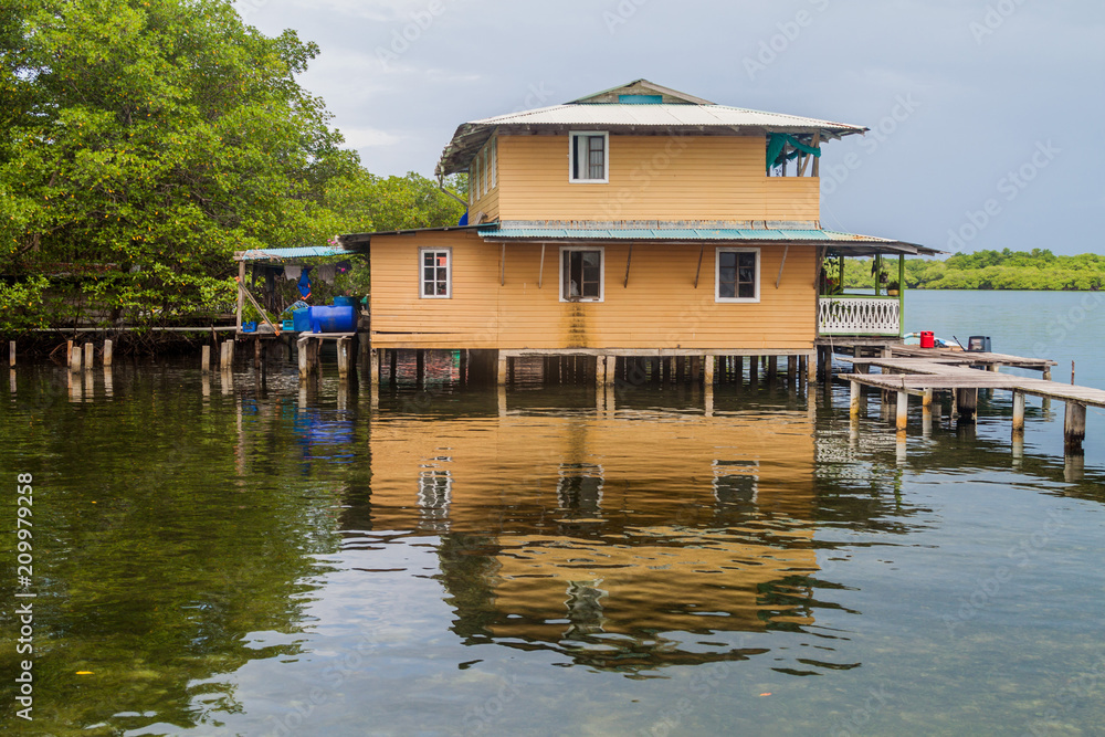House on stilts on a small island in Bocas del Toro archipelago, Panama House on stilts on a small island in Bocas del Toro archipelago, Panama