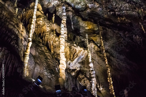 Illuminated multicolored stalactites in cave HAN-SUR-LESSE © keleny