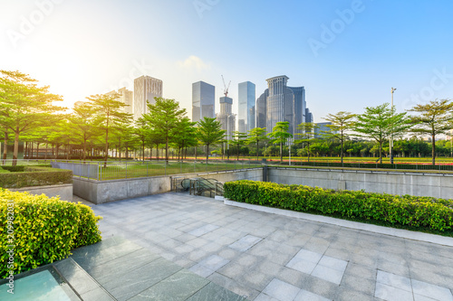Empty square floor and modern commercial building at sunrise in Shenzhen © ABCDstock