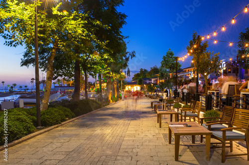 Promenade at the harbour in Side at night, Turkey