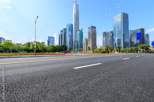 Empty asphalt road and modern city commercial buildings in Shenzhen,China © ABCDstock