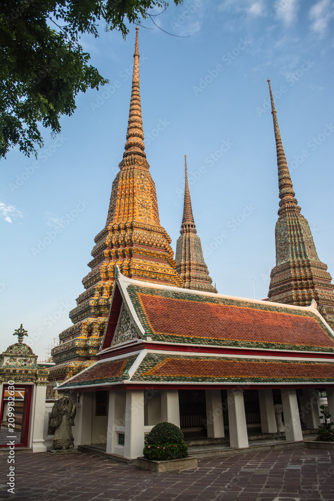 Pagoda is in Wat Pho that was named as the temple of the pagoda or chedi that are decorated with yellow glaze or glazed tiles or dark blue. Pagoda is in Wat Pho that was named as the temple of the pagoda or chedi that are decorated with yellow glaze or glazed tiles or dark blue.