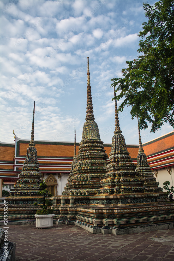 Pagoda is in Wat Pho that was named as the temple of the pagoda or chedi that are decorated with yellow glaze or glazed tiles or dark blue. Pagoda is in Wat Pho that was named as the temple of the pagoda or chedi that are decorated with yellow glaze or glazed tiles or dark blue.