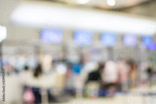 Abstract blur image of people walk in the airport © Suwatchai