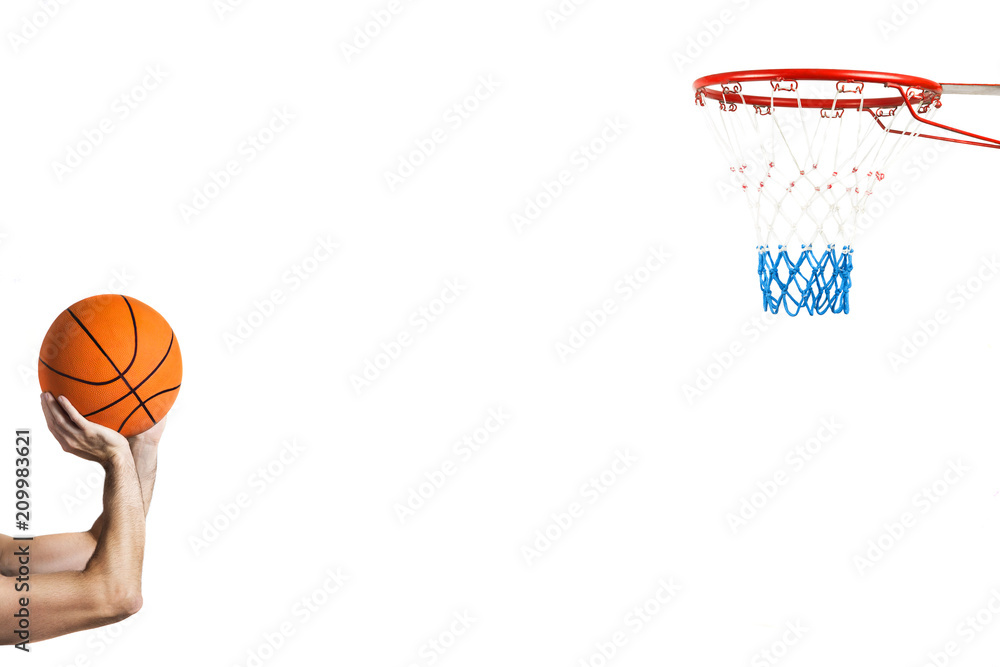 Fototapeta premium isolated on white shooting at the basket / portrait of the arms of a basketball player intent on shooting the basket