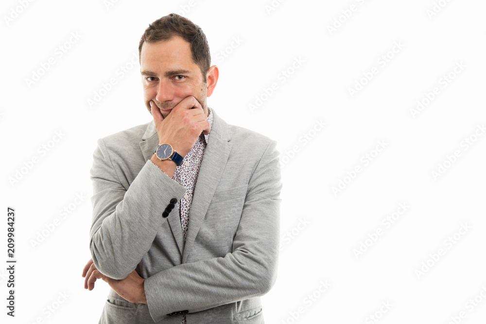 Portrait of business man looking suspiciously Portrait of business man looking suspiciously