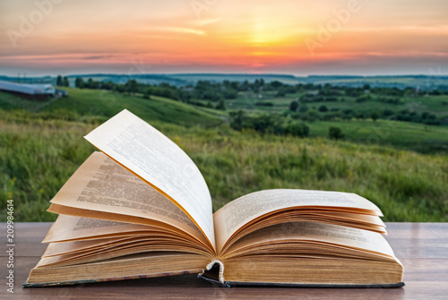 book on sunset background