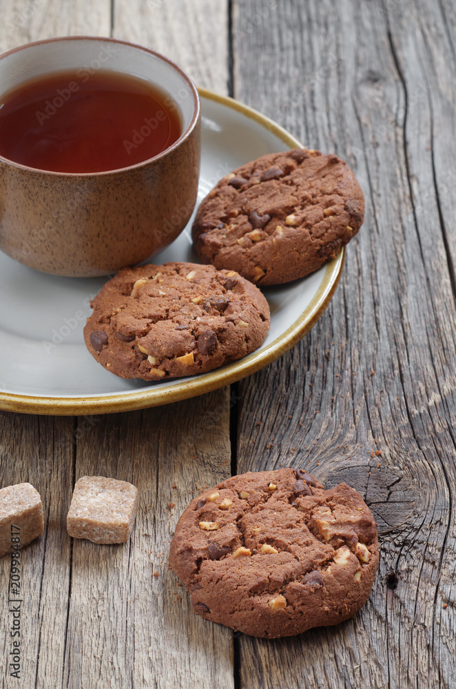 Fototapeta premium Tea and cookies with chocolate