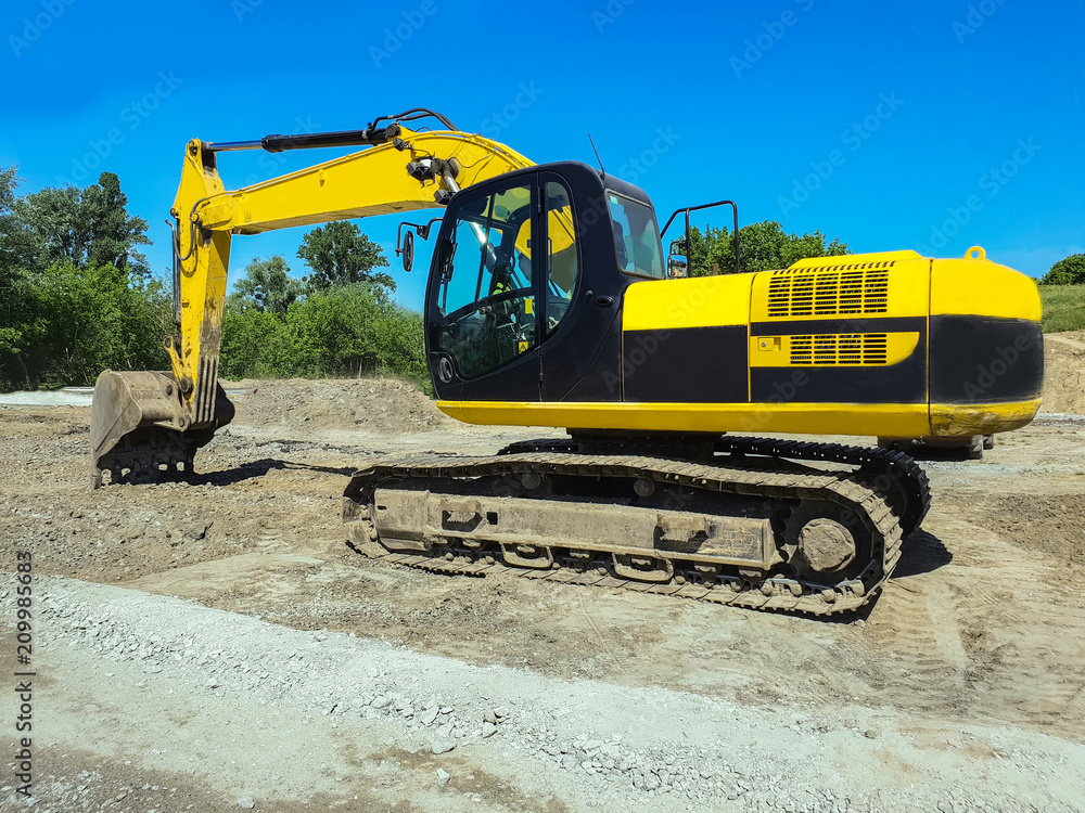 Obraz premium operating construction equipment, working machinery