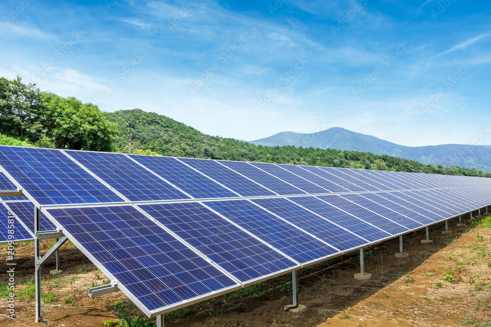 Solar panels and mountains landscape Solar panels and mountains landscape