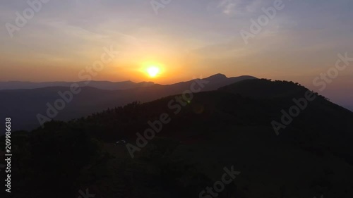 Wallpaper Mural Panning view of beautiful scenic mountains with sunset in distance Torontodigital.ca