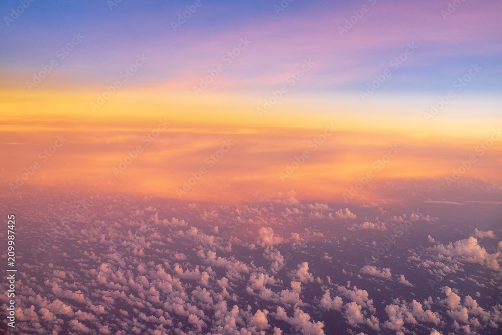 Colorful sky during sunset, view from airplane