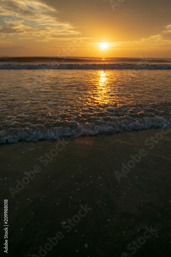 Beautiful golden sunrise at the sea