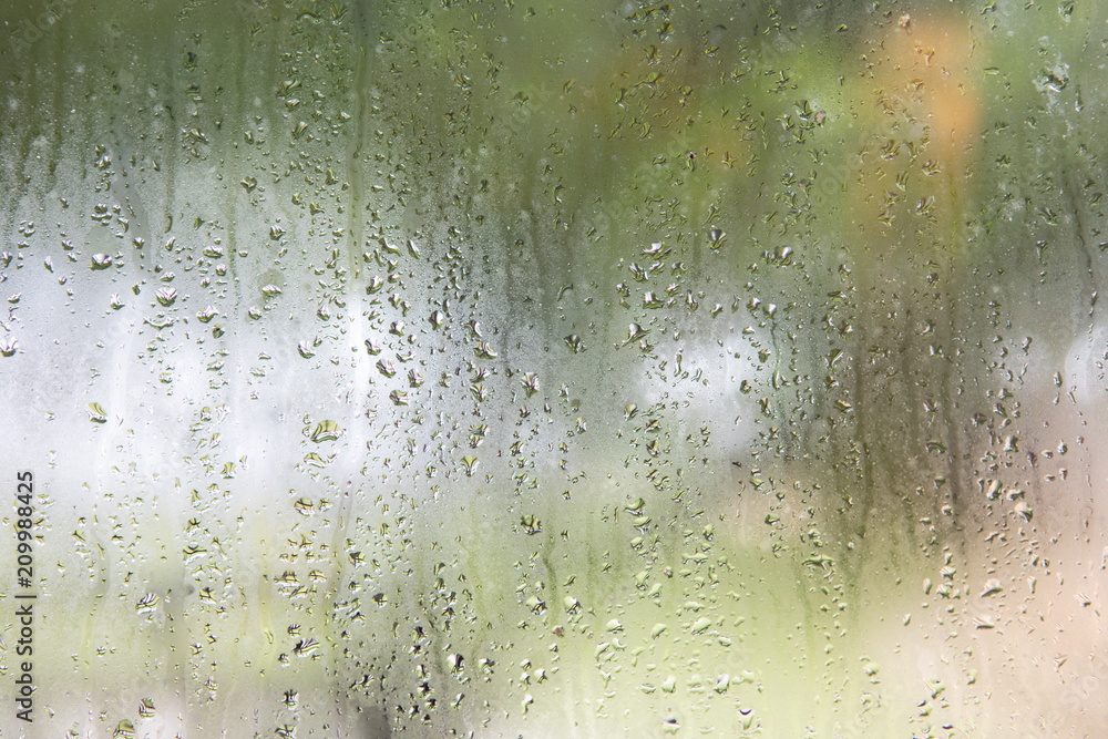 Rain drops on window glasses surface Rain drops on window glasses surface