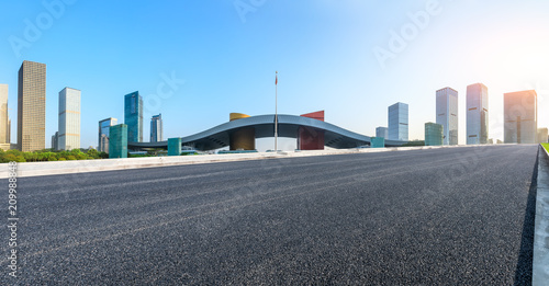 Empty asphalt road and modern city skyline panorama in Shenzhen China