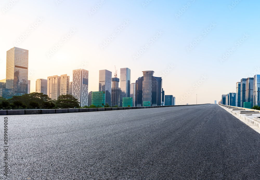 Empty asphalt road and modern city skyline in Shenzhen,China Empty asphalt road and modern city skyline in Shenzhen,China