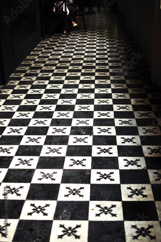 black and white checkered flooring, board game look-a-like tiles, 