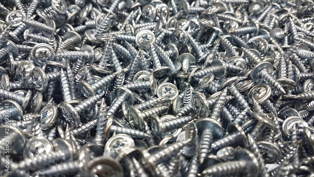 metal screw, iron screw, chrome screw, screws as a background metal screw, iron screw, chrome screw, screws as a background