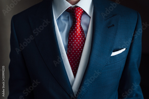 Close up of goom tie and handkerchief photo