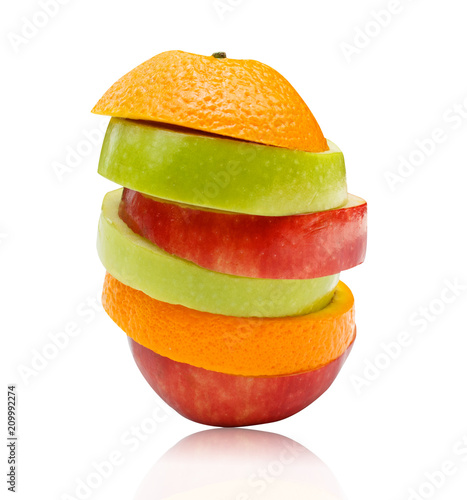 Sliced apples and orange fruit isolated on white background