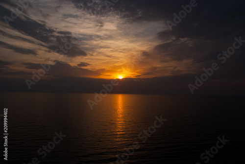 Sunset in sea on dramatic sky with clouds. transience of life. Seascape in evening dusk. Next day will be better. Sunrise view. Meeting sunset on sea. Nature and environment. Vacation and wanderlust